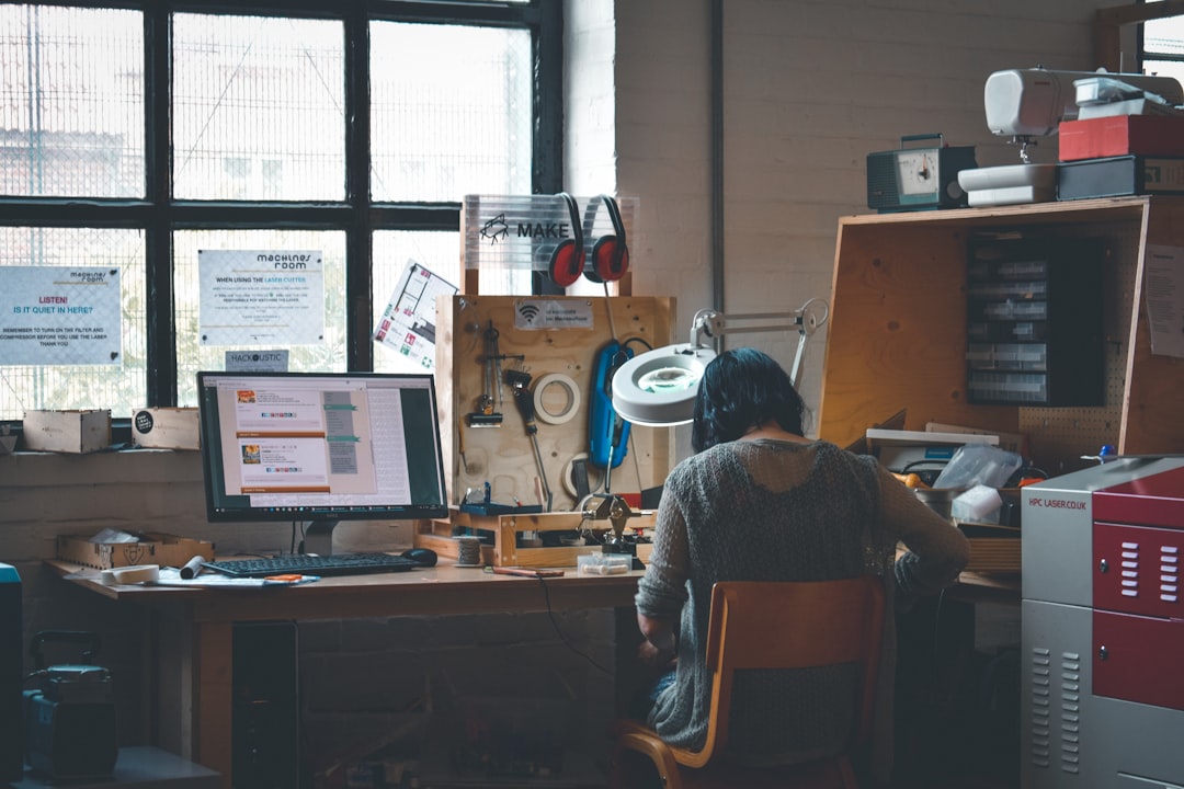 Graphic design jobs UK shocking truths - designer working at desk