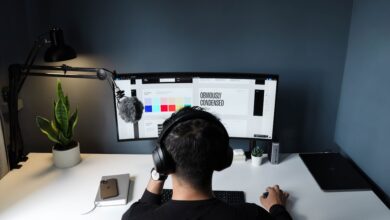 Transcription jobs UK - headphones and laptop for remote work