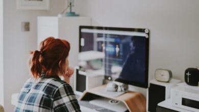UK Virtual Assistant jobs - professional woman working remotely on computer